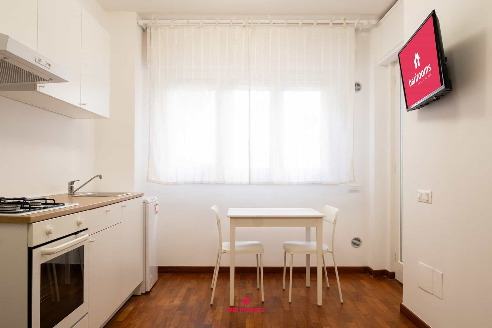 Cucina attrezzata con zona pranzo, appartamento Maison 30 Bari